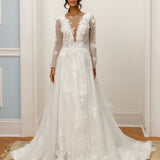 Long-sleeve A-line gown - Plunging neckline bridal dress - Floral lace appliqué dress - Sheer lace sleeves - Fitted bodice - Full tulle skirt - Elegant wedding dress - Formal bridal gown - Timeless beauty gown - Romantic wedding attire