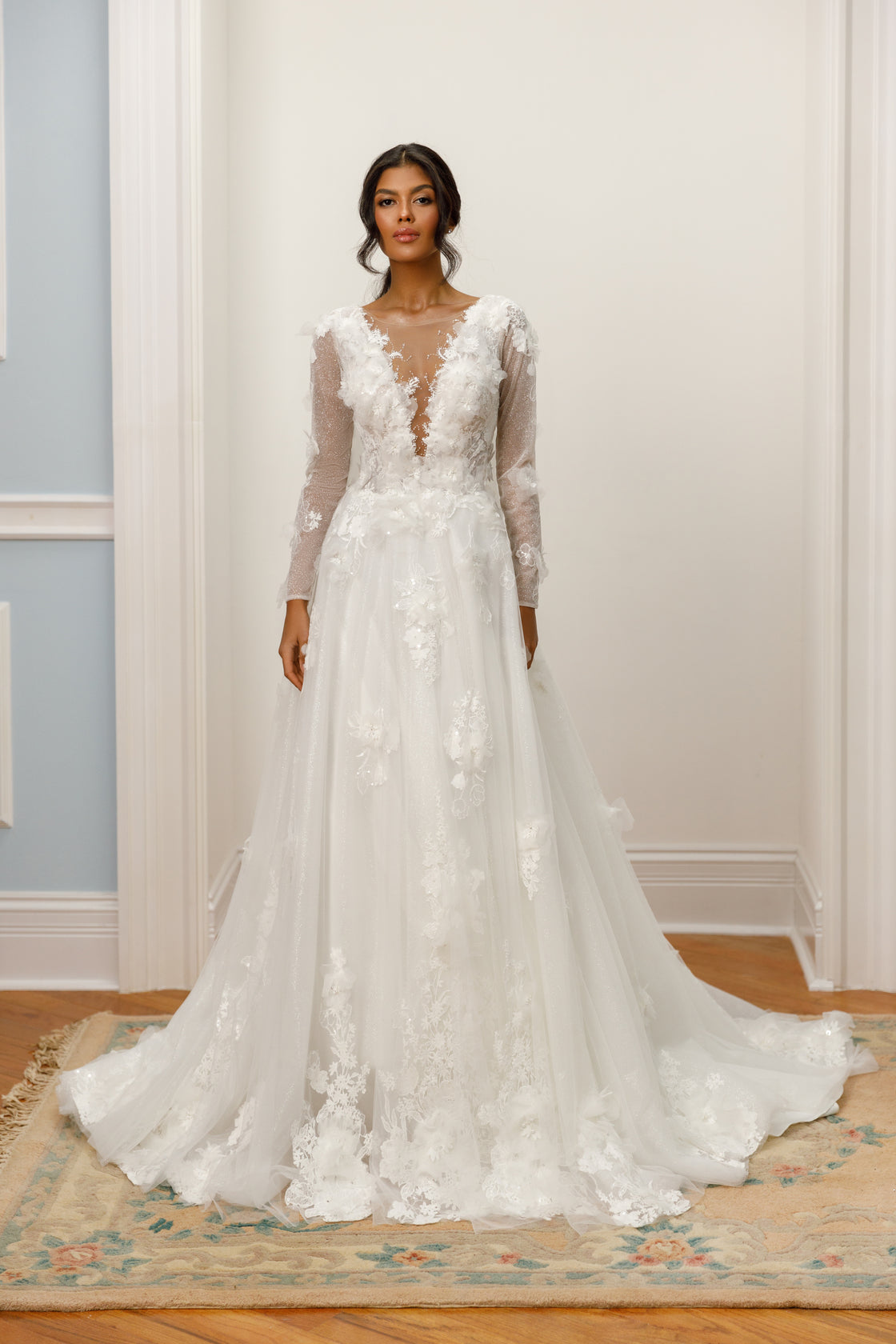 Long-sleeve A-line gown - Plunging neckline bridal dress - Floral lace appliqué dress - Sheer lace sleeves - Fitted bodice - Full tulle skirt - Elegant wedding dress - Formal bridal gown - Timeless beauty gown - Romantic wedding attire