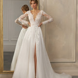 Long-sleeve A-line gown - Plunging neckline bridal dress - Floral lace appliqué dress - Sheer lace sleeves - Fitted bodice - Flowing skirt with high slit - Elegant wedding dress - Formal bridal gown - Modern sophisticated dress - Timeless beauty gown