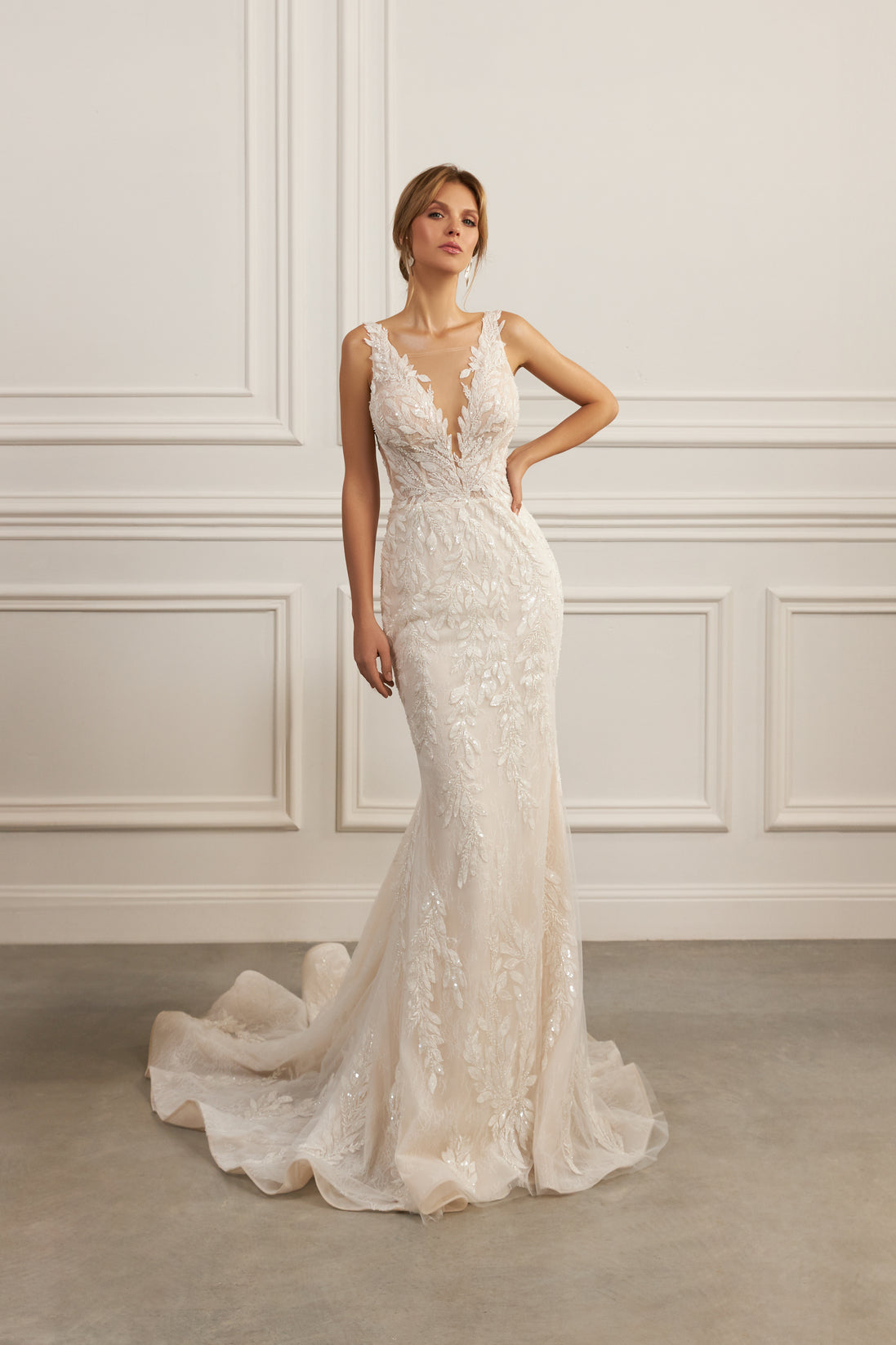Sleeveless mermaid gown - Plunging neckline bridal dress - Floral lace appliqué dress - Fitted silhouette - Mermaid skirt with train - Elegant wedding dress - Formal bridal gown - Timeless beauty gown - Modern sophisticated dress - Curvaceous wedding attire