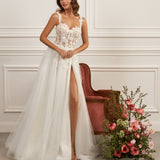 Sleeveless A-line gown - Plunging neckline bridal dress - Floral lace appliqué dress - Sheer corset bodice - Delicate straps - High slit skirt - Elegant wedding dress - Formal bridal gown - Modern romantic dress - Sophisticated wedding attire