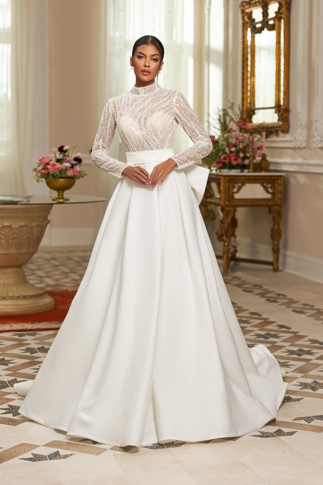 Long-sleeve gown - High neckline bridal dress - Sequin embellished dress - Fitted bodice - Voluminous skirt - Elegant wedding dress - Formal bridal gown - Sophisticated wedding attire - Timeless beauty gown - Regal wedding dress