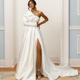 One-shoulder gown - Asymmetrical neckline bridal dress - Long sleeve wedding dress - High slit gown - Sleek fitted bodice - Modern wedding dress - Elegant formal gown - Contemporary bridal attire - Unique wedding dress - Sophisticated evening gown