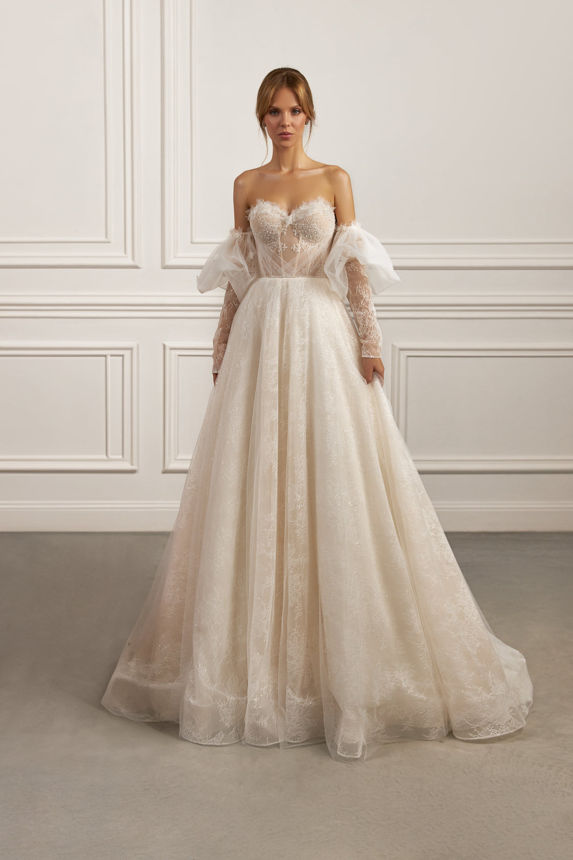 Off-the-shoulder ball gown - Sweetheart neckline bridal dress - Floral lace appliqué dress - Puff sleeves wedding dress - Semi-sheer corset bodice - Full ball gown skirt - Elegant wedding dress - Formal bridal gown - Romantic wedding attire - Timeless beauty gown