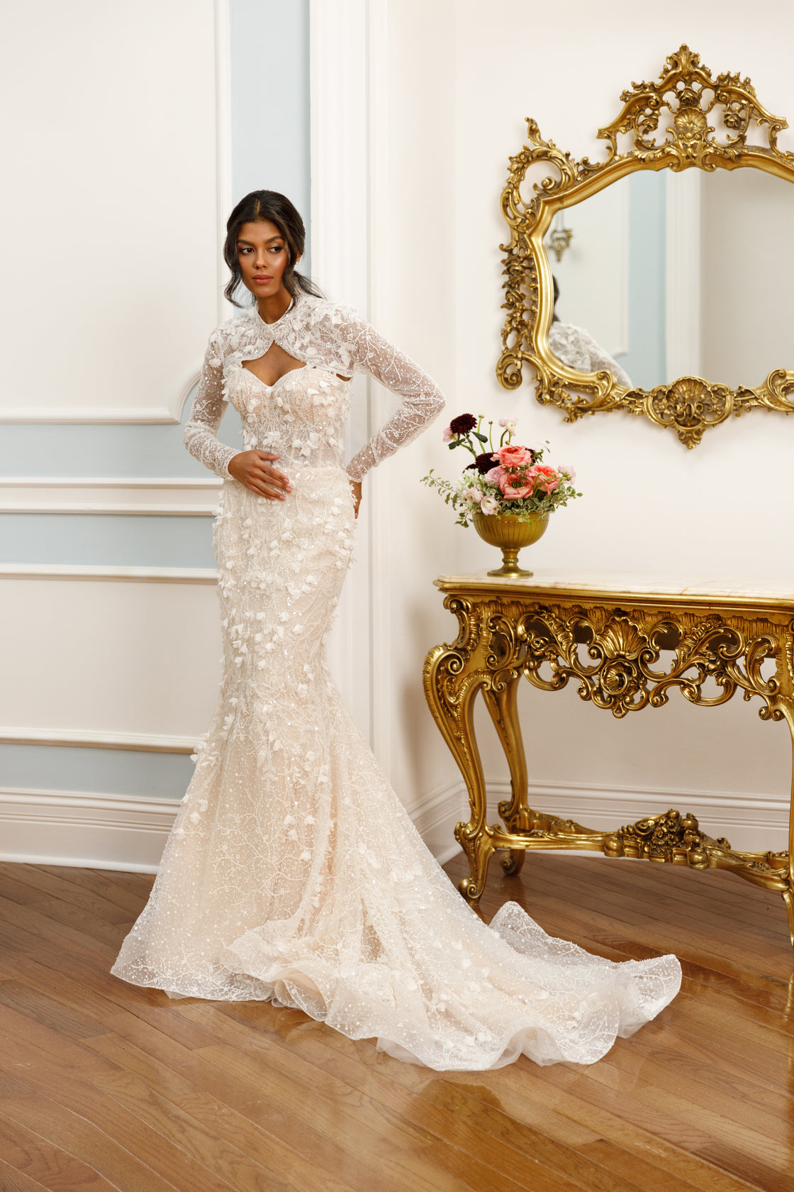 Long-sleeve mermaid gown - High neck bridal dress - Floral lace appliqué dress - Unique cut-out detail - Fitted bodice with lace - Mermaid silhouette with train - Elegant wedding dress - Formal bridal gown - Sophisticated wedding attire - Modern classic gown