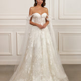 Off-the-shoulder ball gown - Sweetheart neckline bridal dress - Floral lace appliqué dress - Tulle bow sleeves - Structured corset bodice - Full ball gown skirt - Elegant wedding dress - Formal bridal gown - Romantic wedding attire - Timeless beauty gown