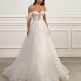 Off-the-shoulder ball gown - Sweetheart neckline bridal dress - Floral lace appliqué dress - Tulle puff sleeves - Semi-sheer bodice - Full ball gown skirt - Elegant wedding dress - Formal bridal gown - Romantic wedding attire - Timeless beauty gown