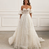 Off-the-shoulder ball gown - Sweetheart neckline bridal dress - Floral lace appliqué dress - Voluminous puff sleeves - Fitted bodice with lace - Full flowing skirt - Elegant wedding dress - Formal bridal gown - Romantic wedding attire - Timeless beauty gown