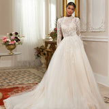 - High-neck lace gown - Long sleeve bridal dress - Intricate lace appliqué dress - Fitted bodice with lace - Voluminous tulle skirt - Elegant wedding dress - Formal bridal gown - Sophisticated wedding attire - Classic wedding dress - Timeless bridal gown