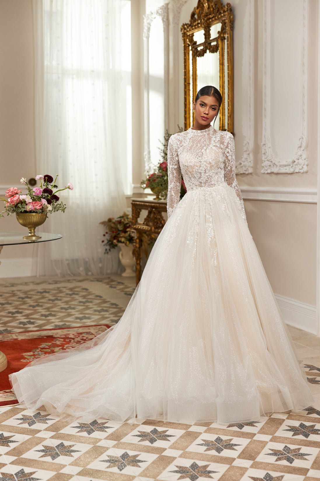 - High-neck lace gown - Long sleeve bridal dress - Intricate lace appliqué dress - Fitted bodice with lace - Voluminous tulle skirt - Elegant wedding dress - Formal bridal gown - Sophisticated wedding attire - Classic wedding dress - Timeless bridal gown