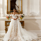 Off-the-shoulder ball gown - Sweetheart neckline bridal dress - Floral lace appliqué dress - Voluminous tulle skirt - Fitted bodice with lace - Dramatic ball gown - Elegant wedding dress - Formal bridal gown - Regal wedding attire - Fairytale wedding dress