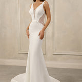 Sleeveless sheath gown - Deep V-neck bridal dress - Glittering illusion panels - Fitted bodice with beading - Minimalist wedding dress - Elegant sheath silhouette - Sophisticated evening dress - Modern bridal gown - Sleek and glamorous dress - Special occasion gown