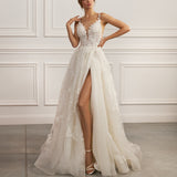 Sleeveless V-neck gown - Floral lace appliqué dress - Plunging neckline gown - Fitted bodice dress - A-line skirt with high slit - Elegant wedding dress - Formal evening dress - Special occasion gown - Timeless beauty dress - Dramatic high slit dress